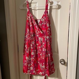 Red maternity tank top with tie back.